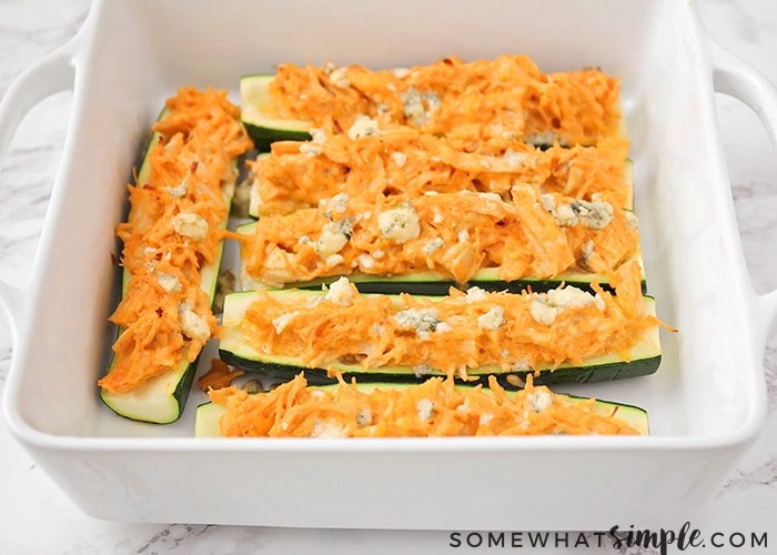 freshly baked buffalo chicken zucchini boats