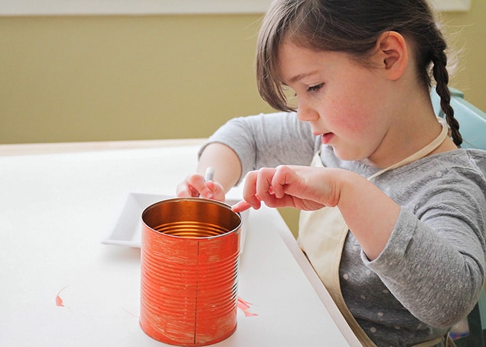 This easy to make indoor herb garden is the perfect project to do with the kids. Add a touch of green to your kitchen and enjoy fresh herbs year round!