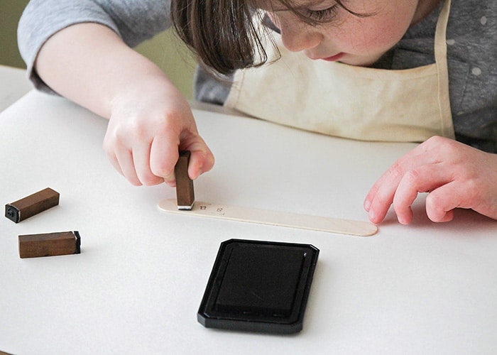 This easy to make indoor herb garden is the perfect project to do with the kids. Add a touch of green to your kitchen and enjoy fresh herbs year round!