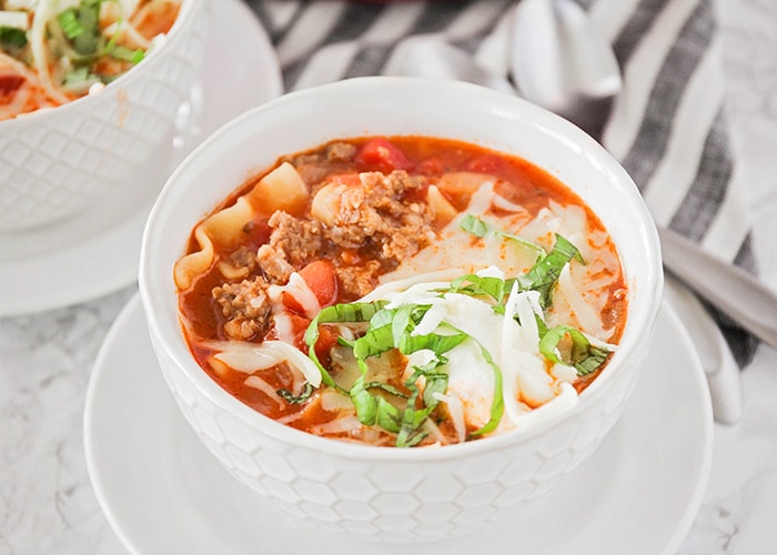 This savory lasagna soup is simple and easy to make, and tastes just like lasagna! It's the perfect hearty soup for a cold night!