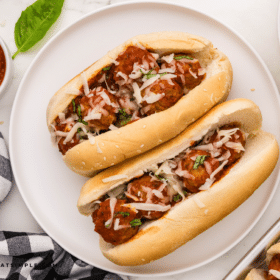 2 Meatball Sandwiches on a white plate