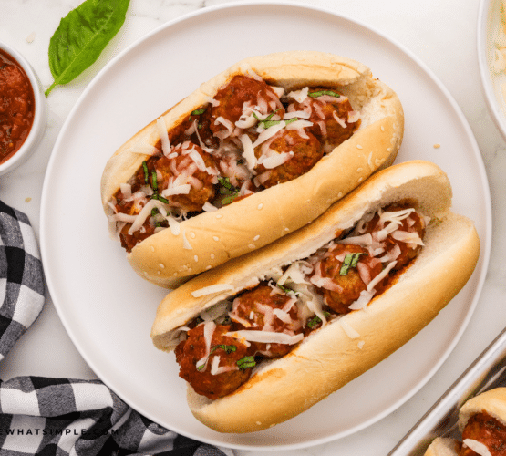 2 Meatball Sandwiches on a white plate