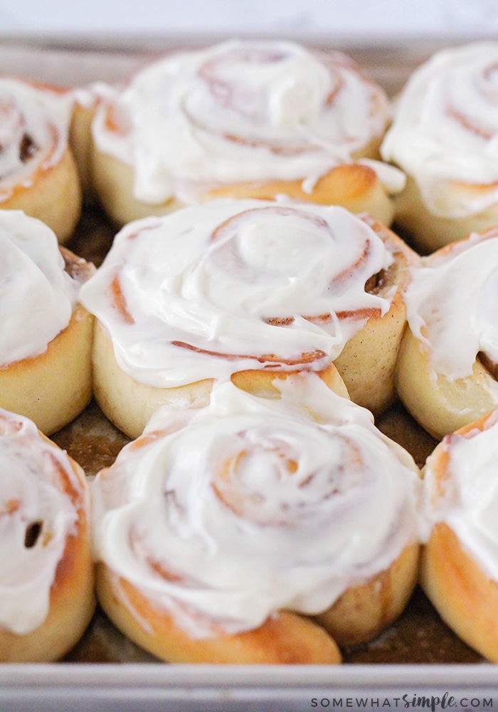 a tray of cinnamon rolls made with this easy recipe and topped with a cream cheese frosting