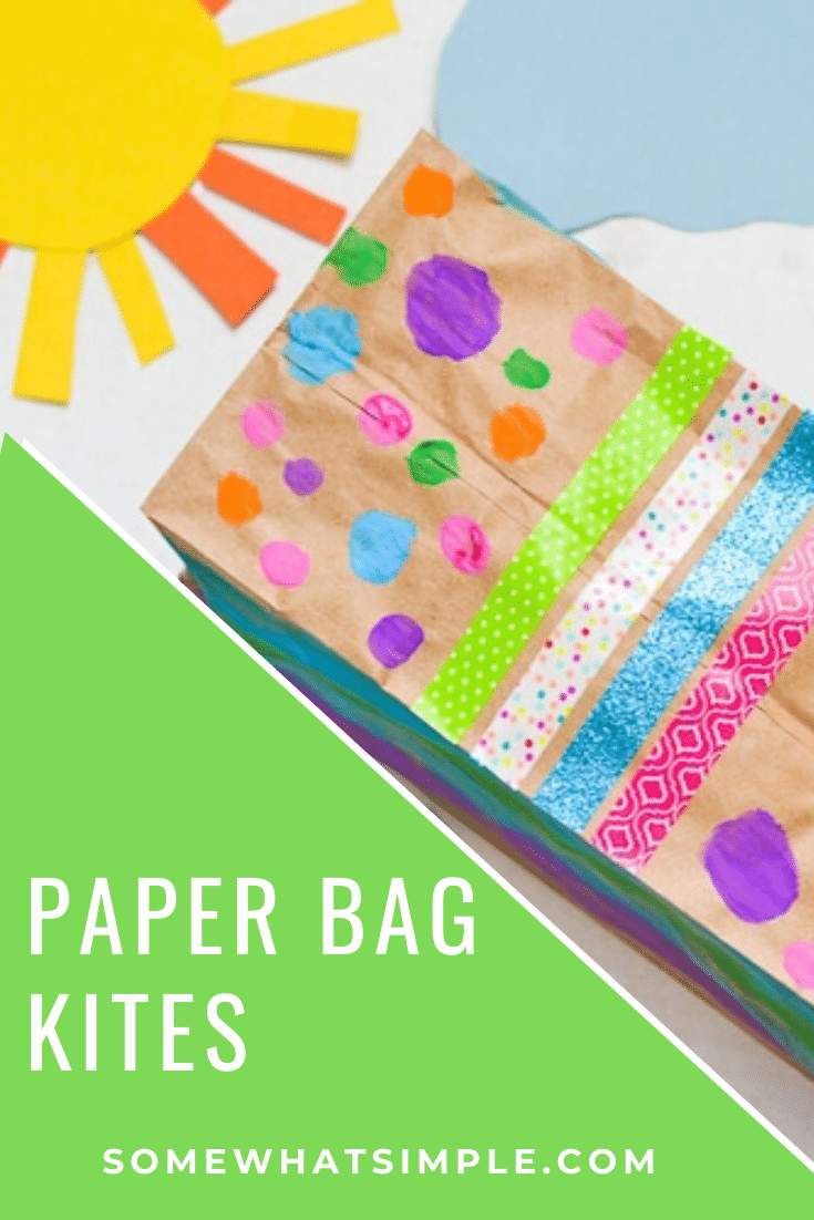 The kids will have so much fun decorating and making their very own paper bag kites - just in time for spring! Made with a brown paper bag and a few simple supplies, they're easy to put together and so much fun to make! #craftsforkids #paperbagkites #papercrafts #howtomakeapaperbagkite #kidscraft via @somewhatsimple