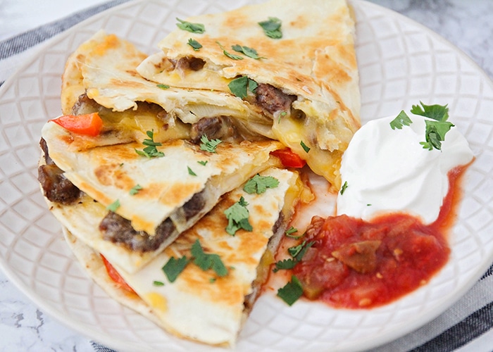 slice of a fajita quesadilla on a plate