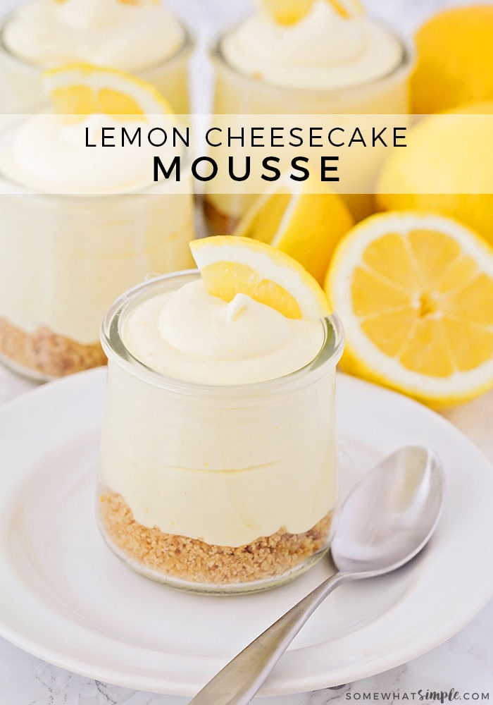 This sweet lemon cheesecake mousse is a decadent dessert that is so easy to make!  Made with fresh lemon curd and resting on a bed of graham crackers, these cheesecake mousse cups are a refreshing treat to enjoy all summer long. #lemon #lemoncheesecakemousse #easycheesecake #cheesecakemousse via @somewhatsimple