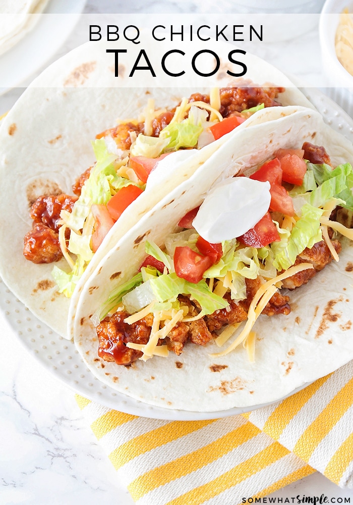 BBQ chicken tacos are a delicious twist on a classic Mexican recipe. Using simple ingredients, they're easy to make! Made with just a few basic ingredients, these tacos are super easy to make and everyone will love them! #tacos #tacotuesday #bbqchickentacorecipe #bbqchicken #bbqchickentacos #chickentacos via @somewhatsimple