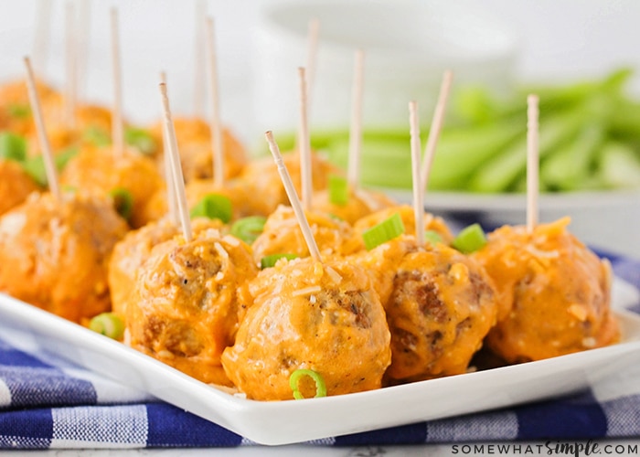 buffalo chicken meatballs on a serving dish are a simple super bowl finger food