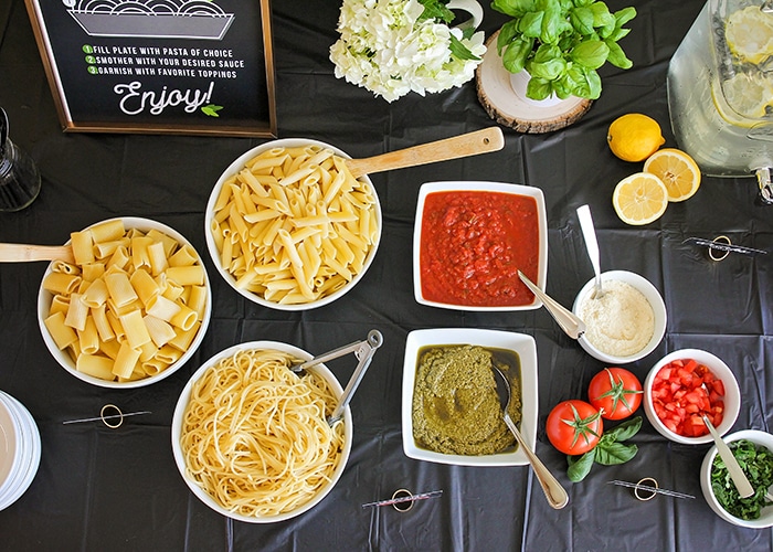 Host a fun and delicious dinner party at home with this easy Italian pasta bar! Mix and match pasta, sauce, and toppings to build the perfect bowl of pasta! 