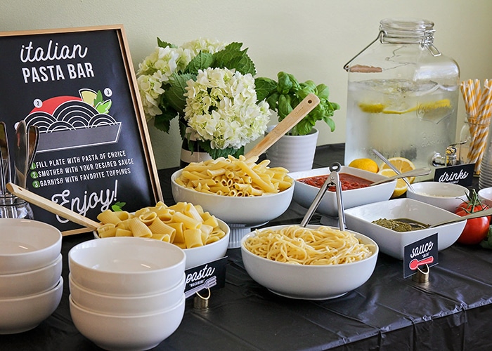 Host a fun and delicious dinner party at home with this easy Italian pasta bar! Mix and match pasta, sauce, and toppings to build the perfect bowl of pasta! 