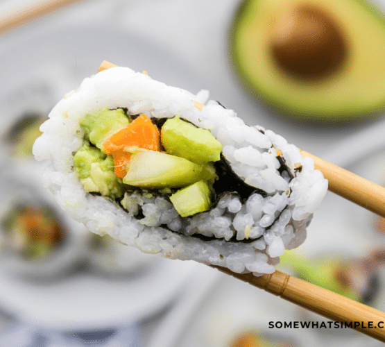 1 california roll in chopsticks