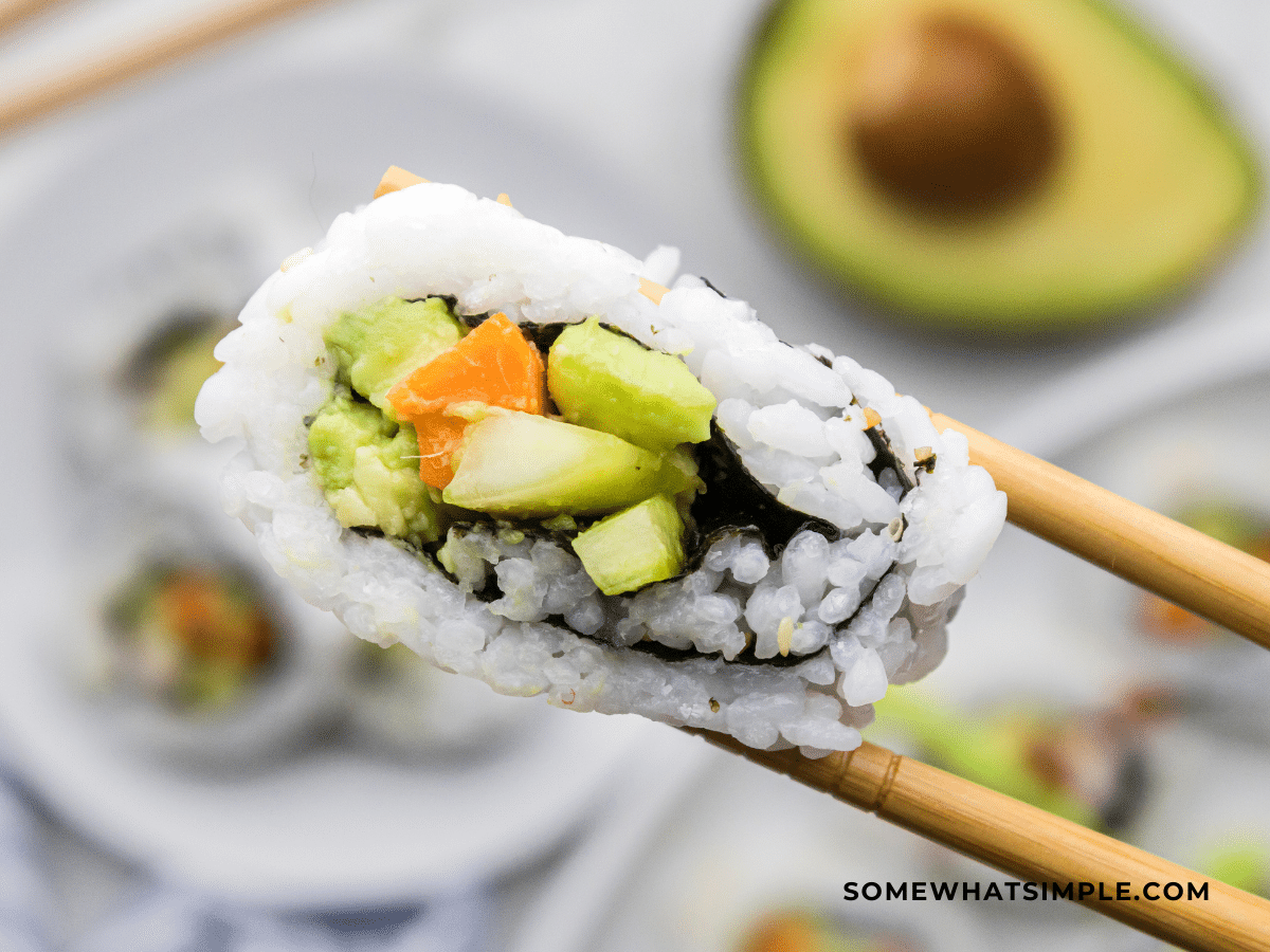 1 california roll in chopsticks