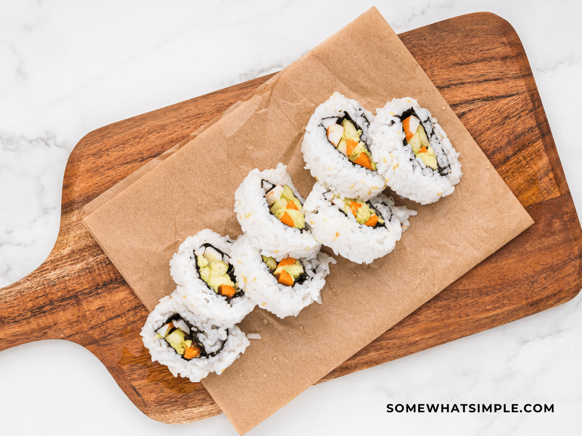 California Rolls plated on a cutting board