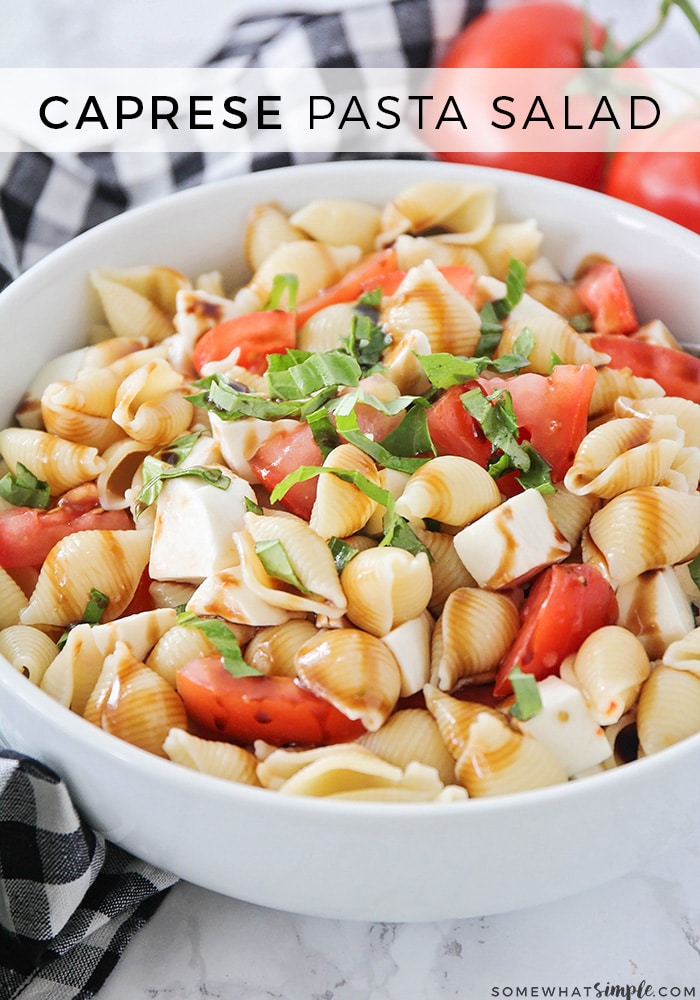 This simple and delicious caprese pasta salad recipe is so fresh and easy to make. Loaded with pasta, tomatoes, mozzarella cheese and topped with fresh basil and a balsamic dressing, it's the perfect side dish for any summer potluck or barbecue! #caprese #capresepasta #capresepastasalad #capresepastasaladrecipe #capresesaladrecipe via @somewhatsimple