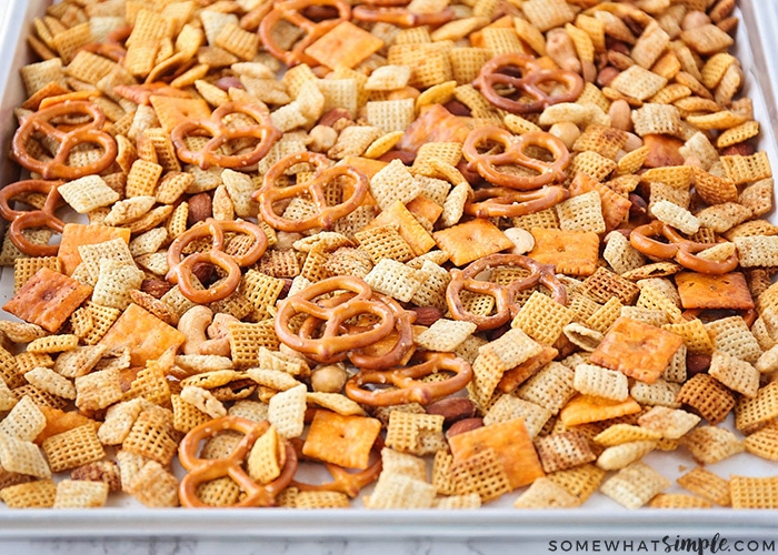 a baking sheet full of original homemade chex mix cooked easily in the microwave