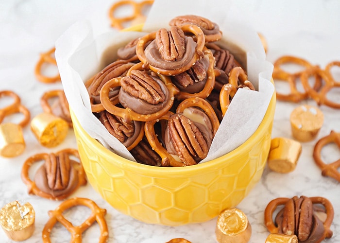 a bowl of rolo pretzel turtles 