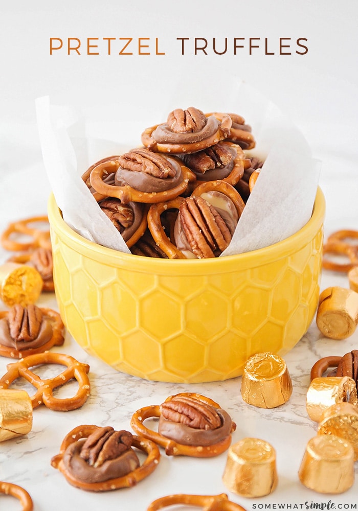 Rolo pretzel turtles are a the perfect salty, sweet and nutty combo.  Made with pretzels, Rolo candy and delicious pecans, there is nothing better than these delicious treats! These delicious treats are easy to make and perfect for when you're hosting a party! They're one of my favorites to make during the holiday season. via @somewhatsimple