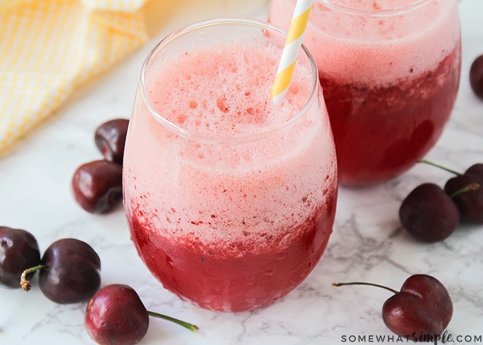 looking down on a glass of filled with this frozen cherry lemonade recipe