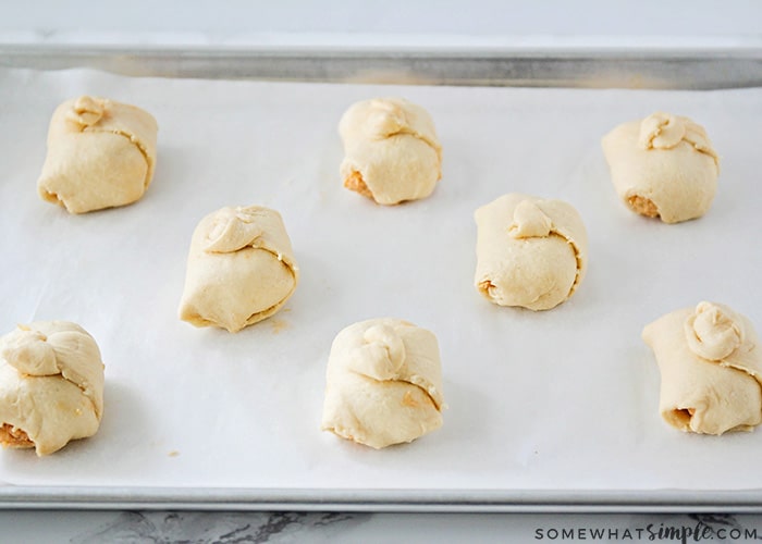 These delicious and savory chicken enchilada puffs are the perfect easy meal! They're stuffed with a cheesy chicken enchilada filling, and taste amazing!