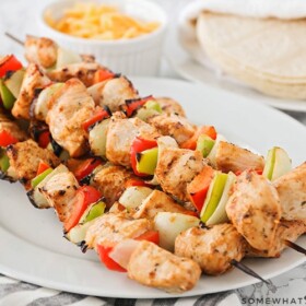 grilled chicken skewers with bell peppers and onions
