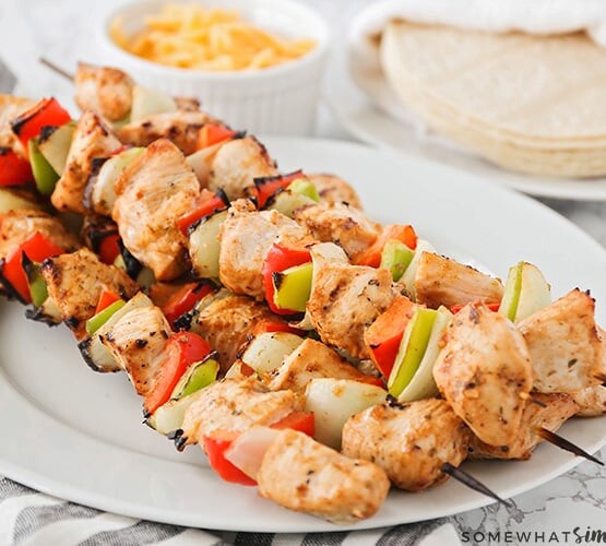 grilled chicken skewers with bell peppers and onions