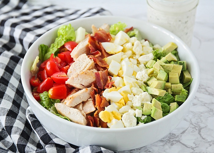 This classic cobb salad is so fresh and delicious, and is the perfect summer meal! It's loaded with protein, and quick and easy to make. 