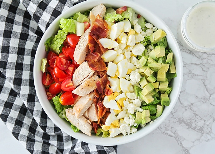 This classic cobb salad is so fresh and delicious, and is the perfect summer meal! It's loaded with protein, and quick and easy to make. 