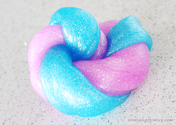 Blue and pink sparkly slime twisted together made with this easy homemade slime recipe.