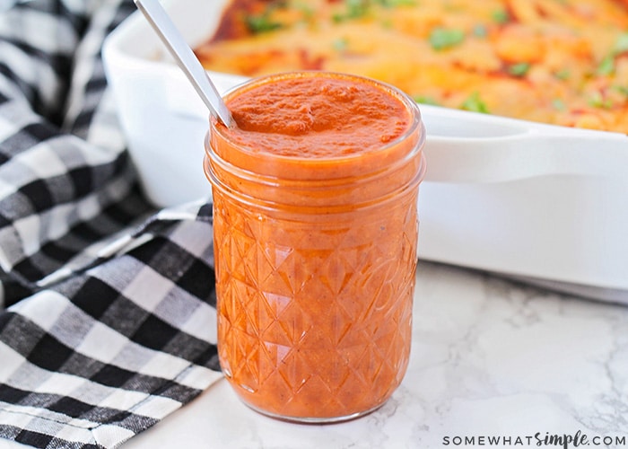 a jar of homemade red enchilada sauce