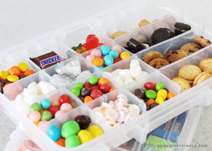 Toddler snack box. Use a fish tackle box to carry around a variety of  snacks for your toddler without having a bunch of co…