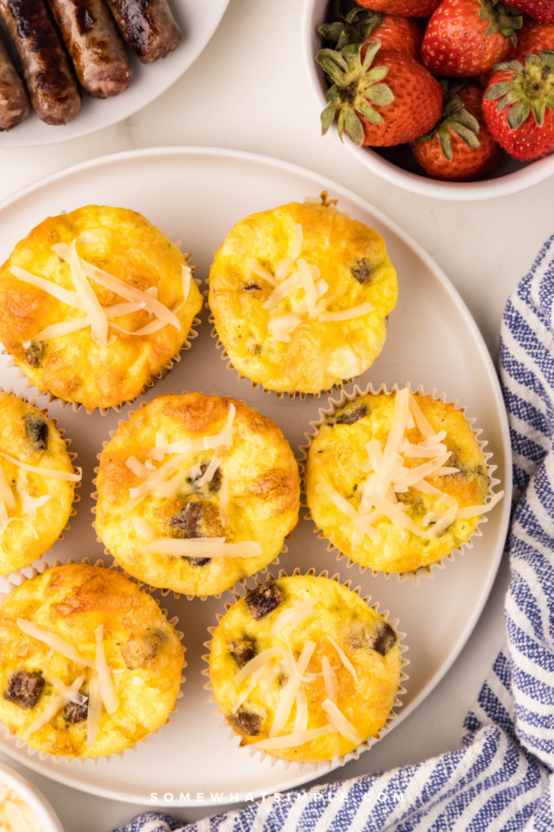 long image of breakfast cupcakes on a white plate