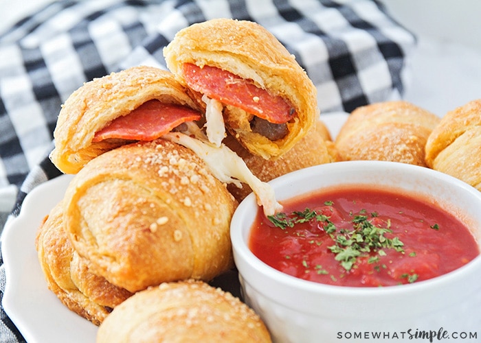 pizza bites on a plate with a side of marinara sauce on a plate using this easy recipe