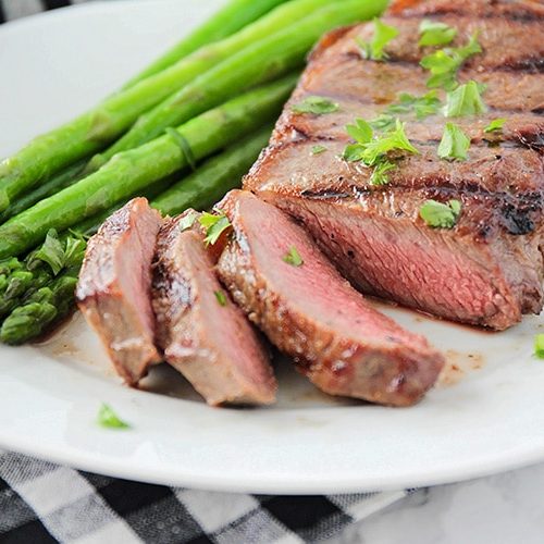 Sous Vide Tenderloin Steaks with Asparagus and Onions