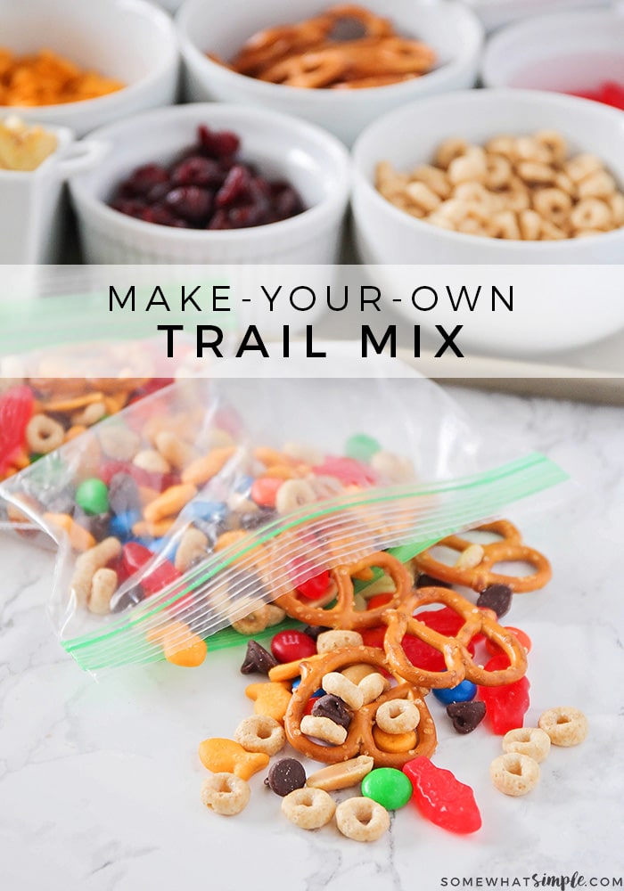 This make your own trail mix bar is such a fun way to get the kids involved. Lay out a variety of trail mix ingredients, and let them assemble their own trail mix snack! It's easy to do and everyone is happy! #trailmix #trailmixrecipe #trailmixbar #kidstrailmix #funtrailmix #easysnackidea via @somewhatsimple