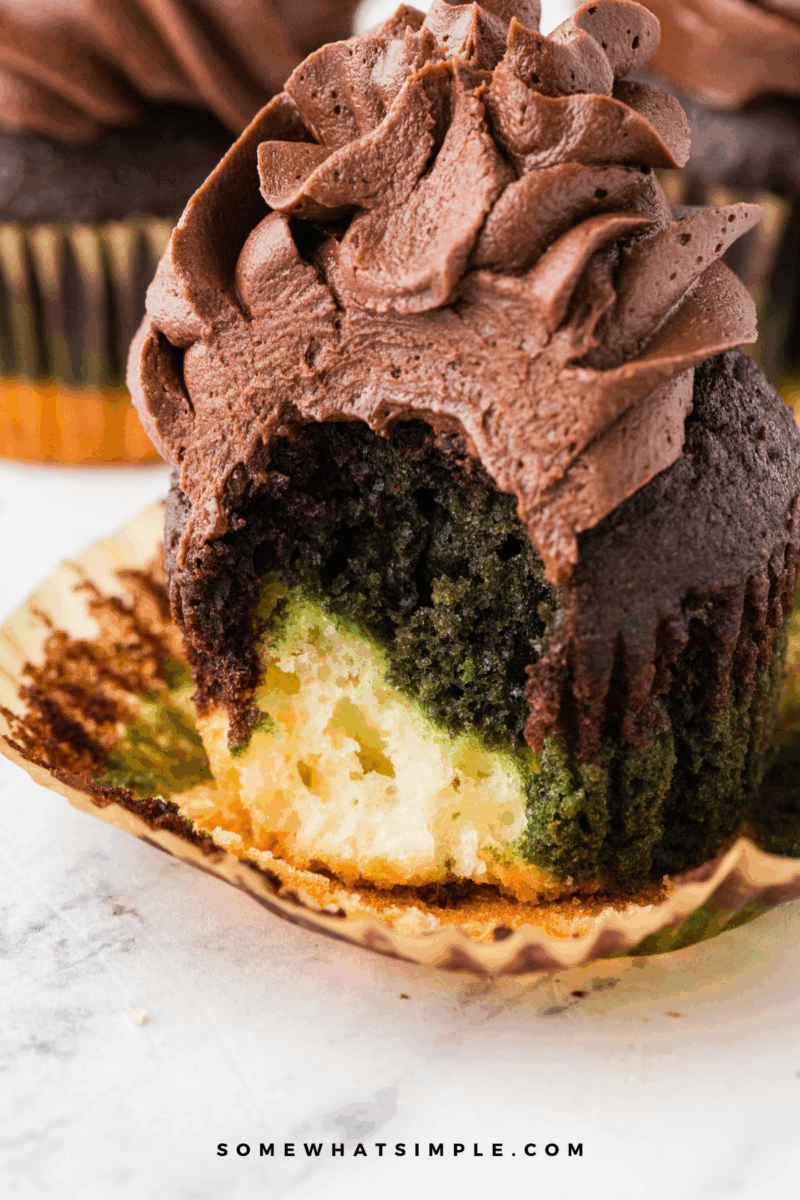 close up of a camo cupcake with a bite out of it
