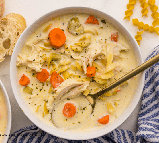 Finished Crockpot Creamy Chicken Noodle Soup in a white bowl.