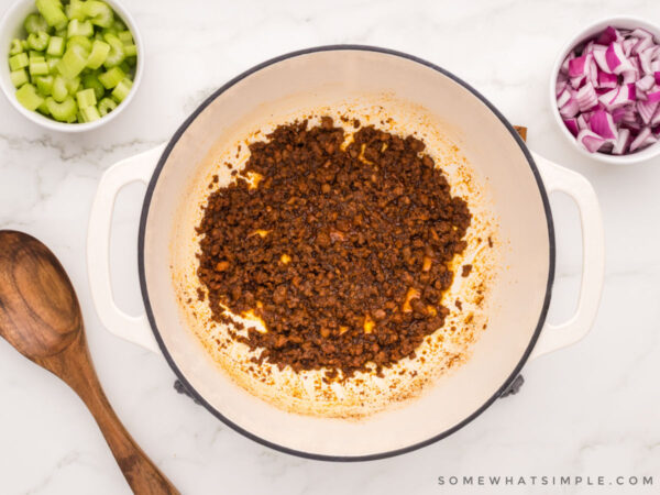 cooking chorizo in a pot