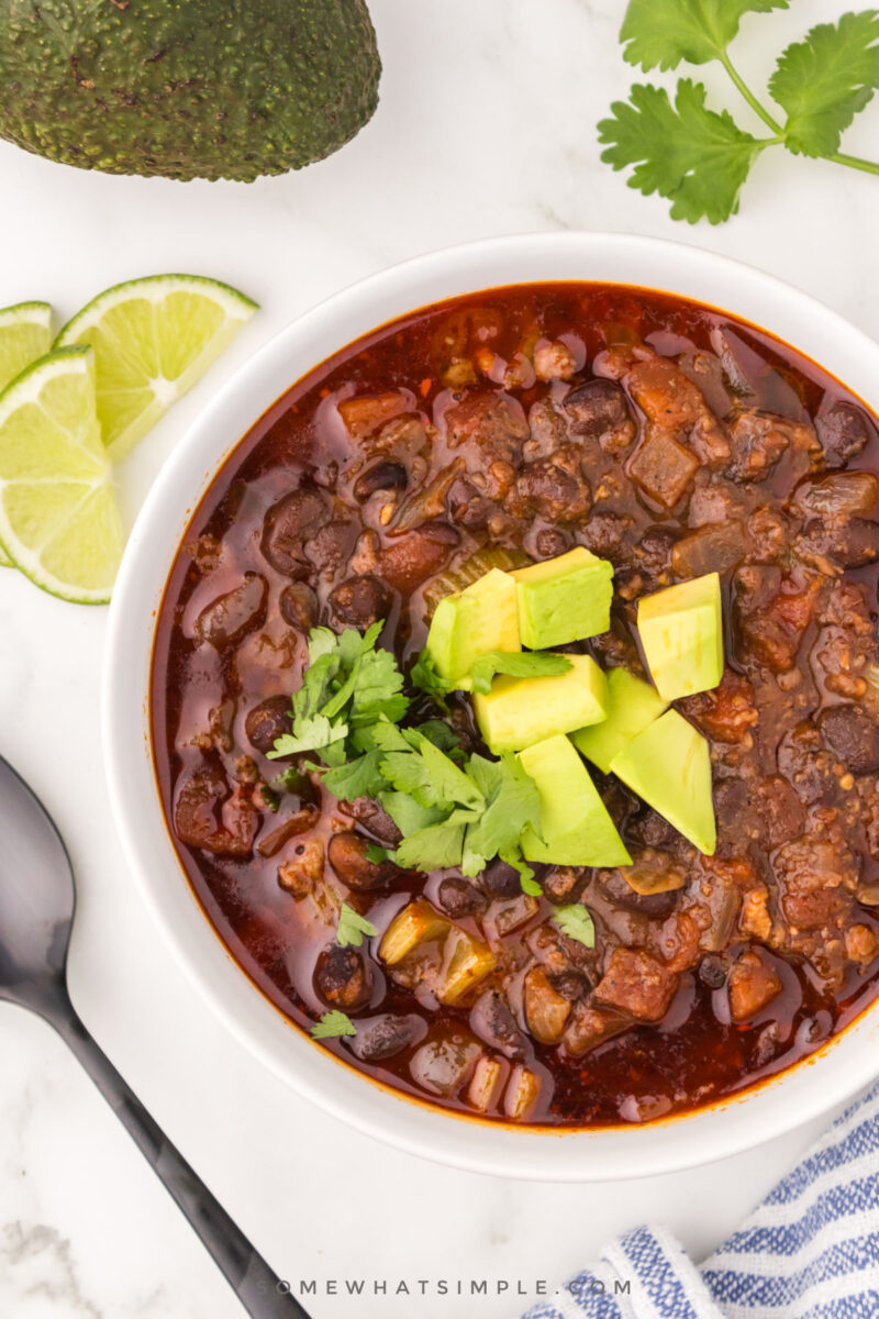 finished chorizo soup with diced avocado and cilantro