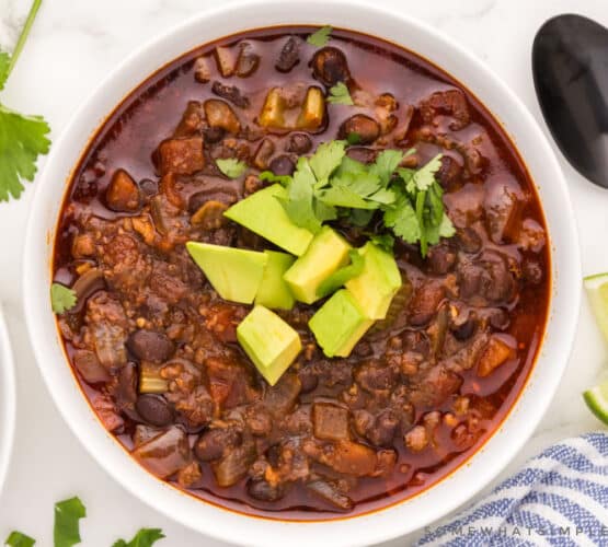 finished chorizo soup in a white bowl