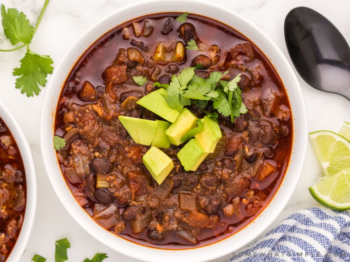 finished chorizo soup in a white bowl