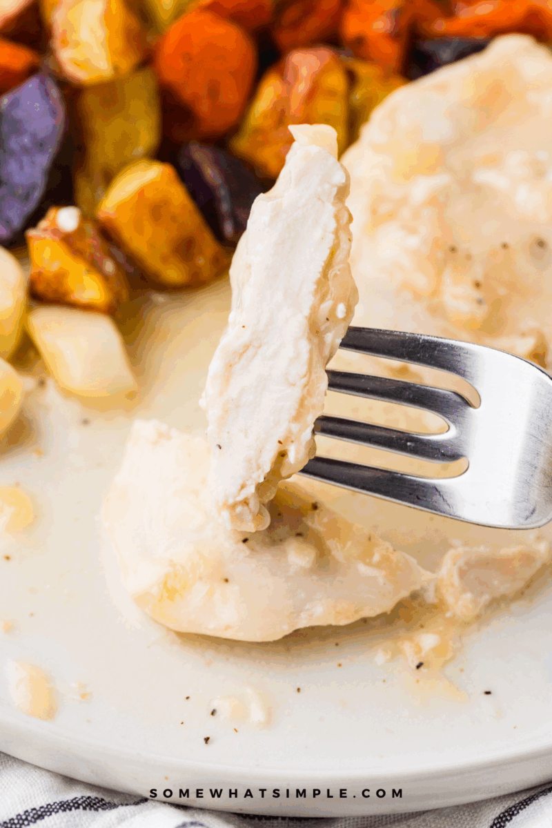 delicious piece of Garlic Chicken on a fork