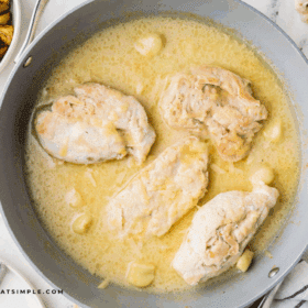Garlic Chicken in a skillet in a creamy sauce