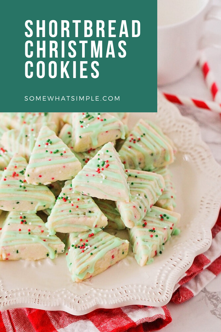 Shortbread Cookies are sweet and buttery and melt in your mouth! These Shortbread Christmas Cookies are easy to make and only require a few simple ingredients! Decorated to look like Christmas trees, this delicious cookies are simple and easy to make during the holiday season. They're perfect to share at your Christmas party with friends and neighbors. via @somewhatsimple