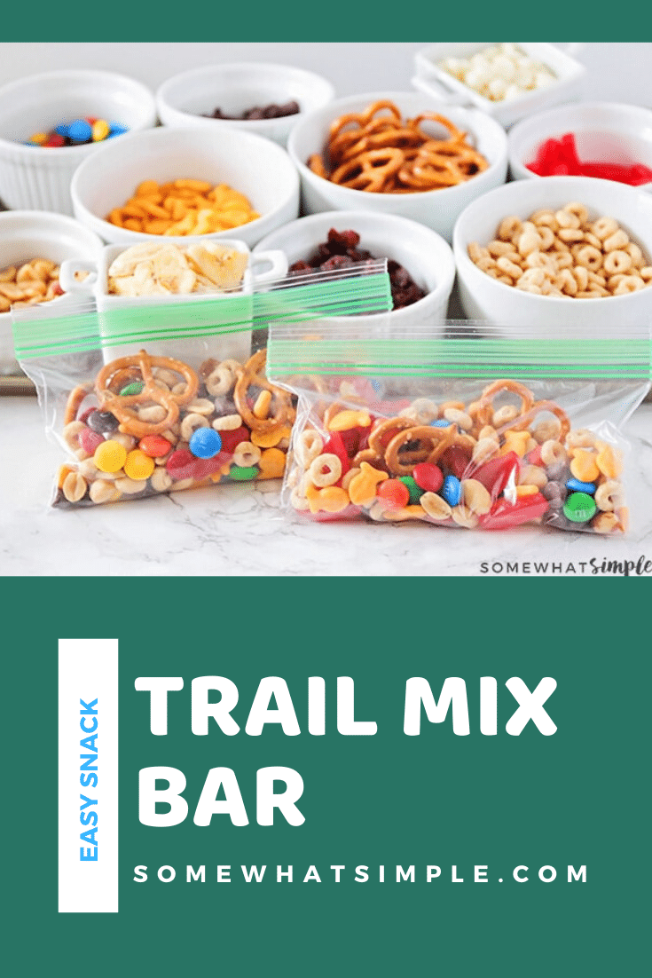 This make your own trail mix bar is such a fun way to get the kids involved. Lay out a variety of trail mix ingredients, and let them assemble their own trail mix snack! It's easy to do and everyone is happy! #trailmix #trailmixrecipe #trailmixbar #kidstrailmix #funtrailmix #easysnackidea via @somewhatsimple
