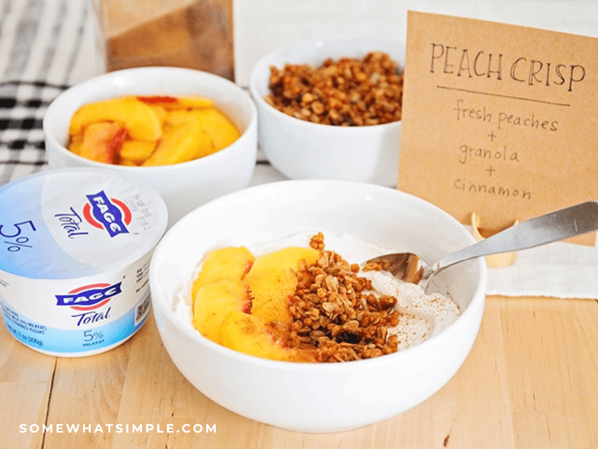 close up of a peach cobbler yogurt parfait
