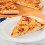 a slice of Homemade Apple Cheddar Bacon Pizza