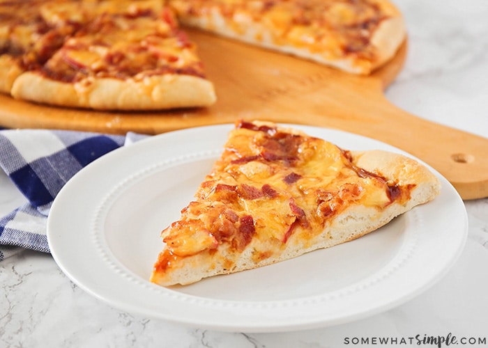 a slice of Homemade Apple Cheddar Bacon Pizza