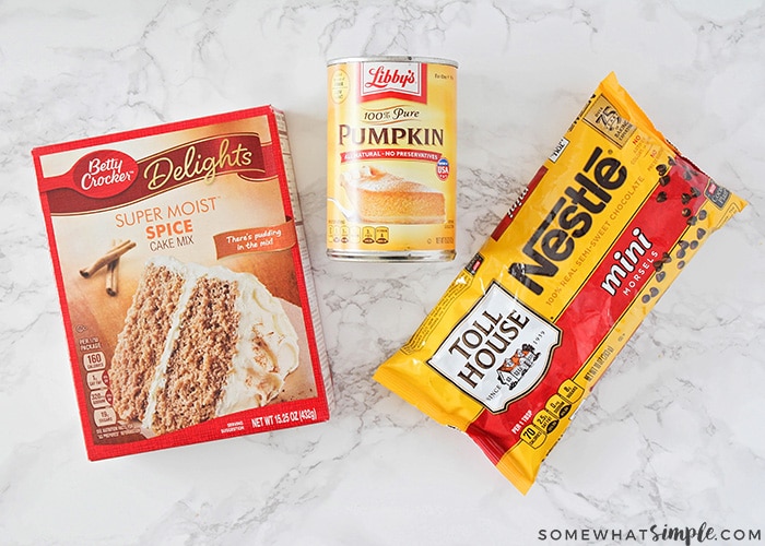 a box of pumpkin spice cake mix, a can of pumpkin puree and a bag of chocolate chips are the 3 ingredients you'll need to make this cookie recipe.