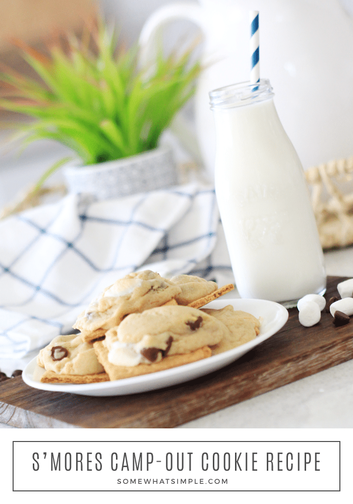 Now you can have the deliciousness of s'mores all year round! These s'mores cookies are so simple to make, people will be begging for the recipe! Made with the delicious combination of chocolate, graham crackers and a hot, gooey marshmallow, these cookies are irresistible! #smorescookies #howtomakesmorescookies #campingrecipes #easysmorescookies #smorescookierecipe via @somewhatsimple