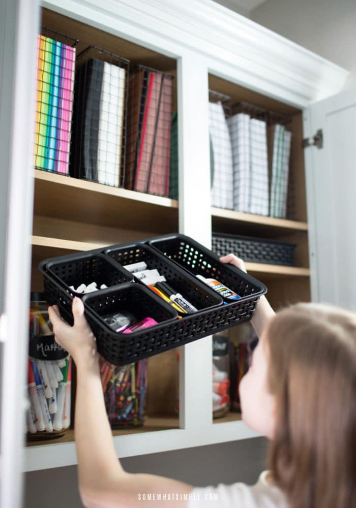 Child using home office supplies